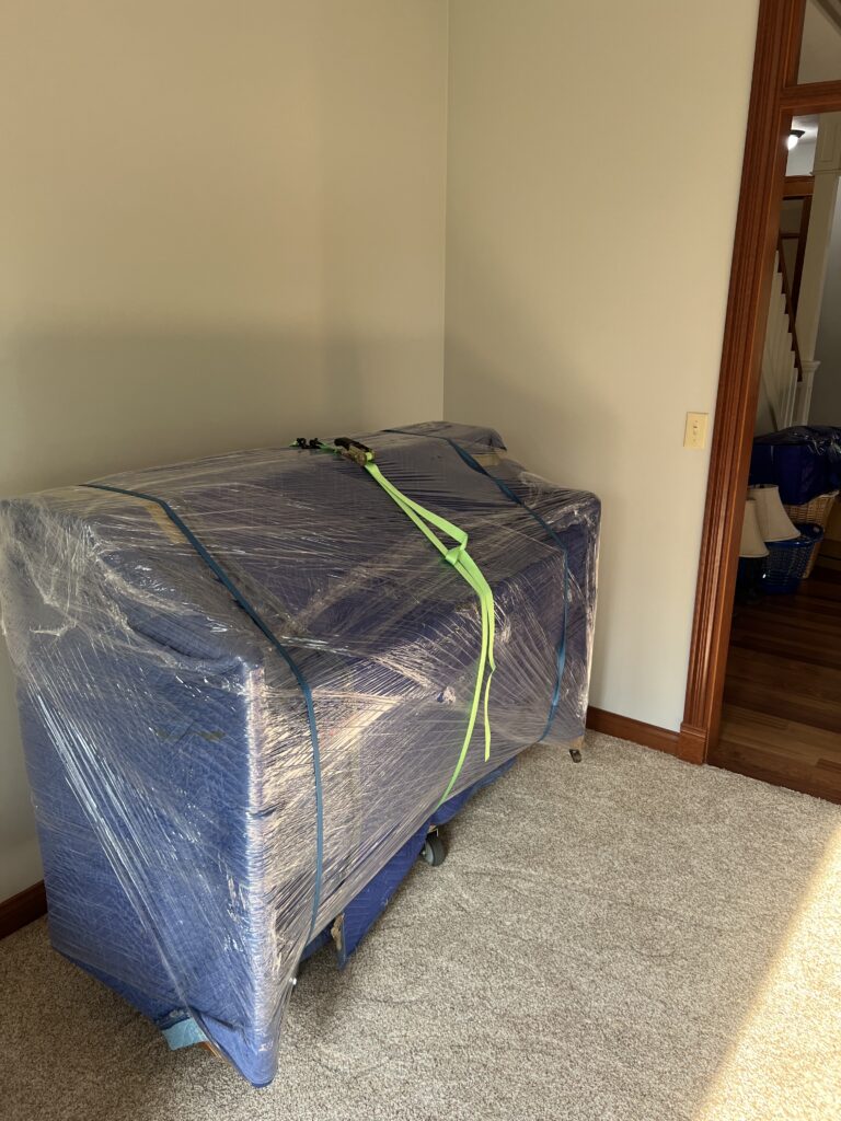 Piano professionally moved and wrapped