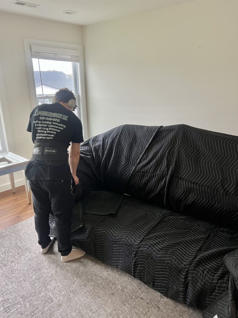 Mover wrapping couch for its move