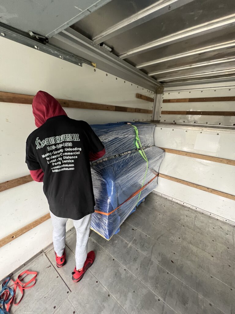 Professional Movers near me packing a piano