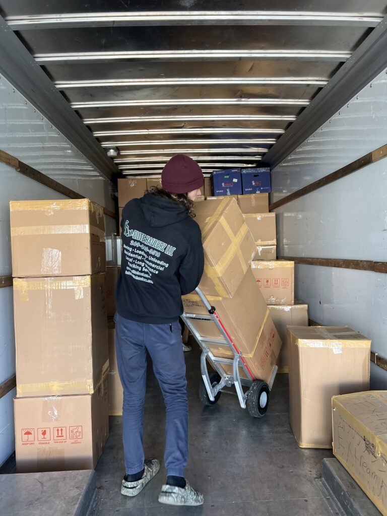 Mover moving boxes with a dolly